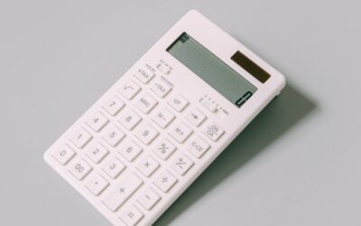 white calculator on white table