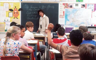 woman standing in front of children